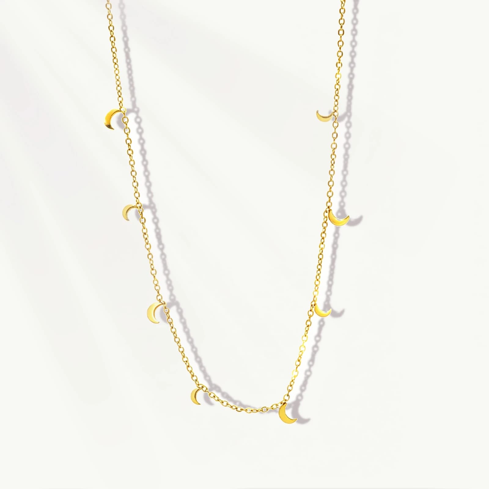 Crescent Moon Charm Necklace in stainless steel