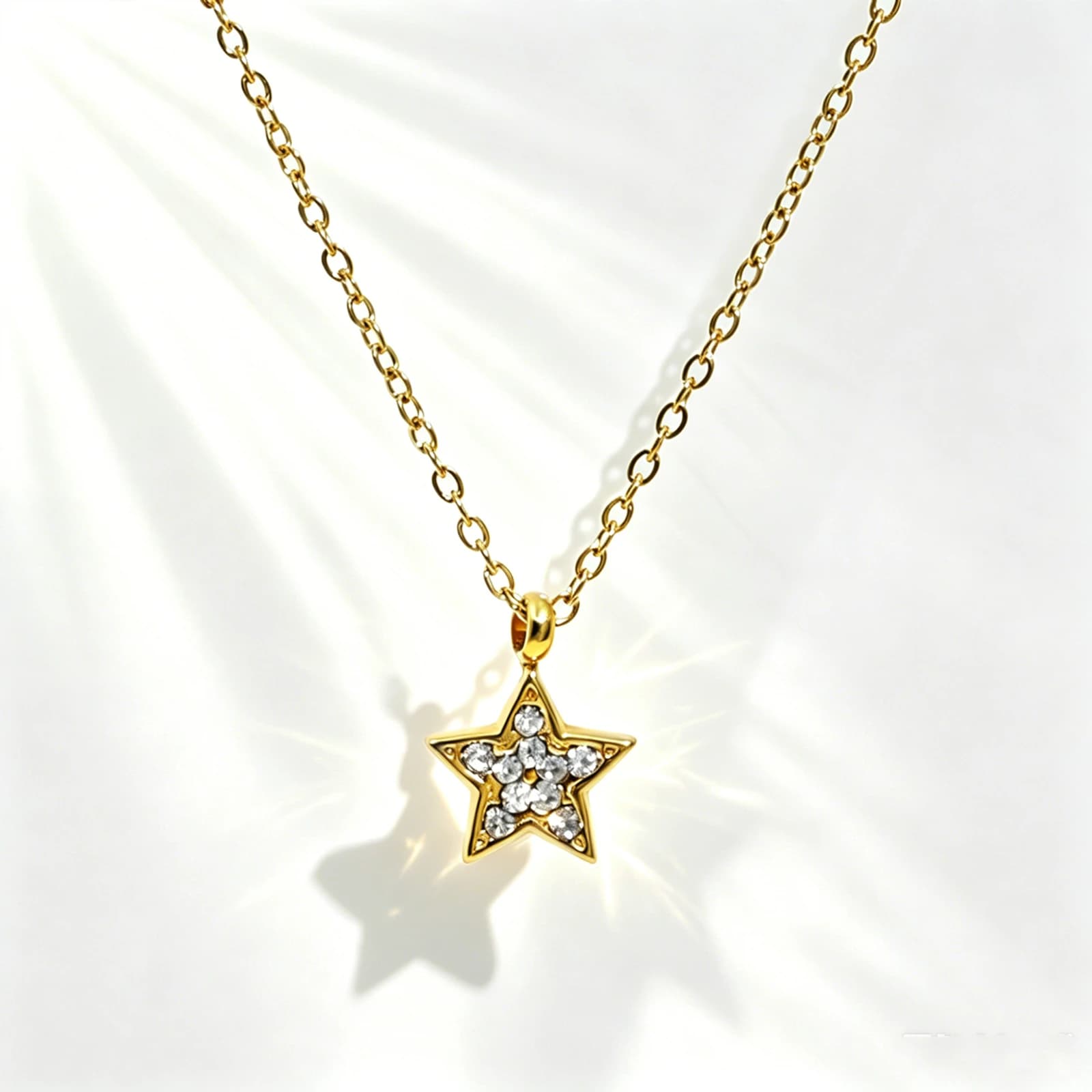Rhinestone Five-Point Star Pendant Necklace with clear white rhinestone and gold-tone stainless steel